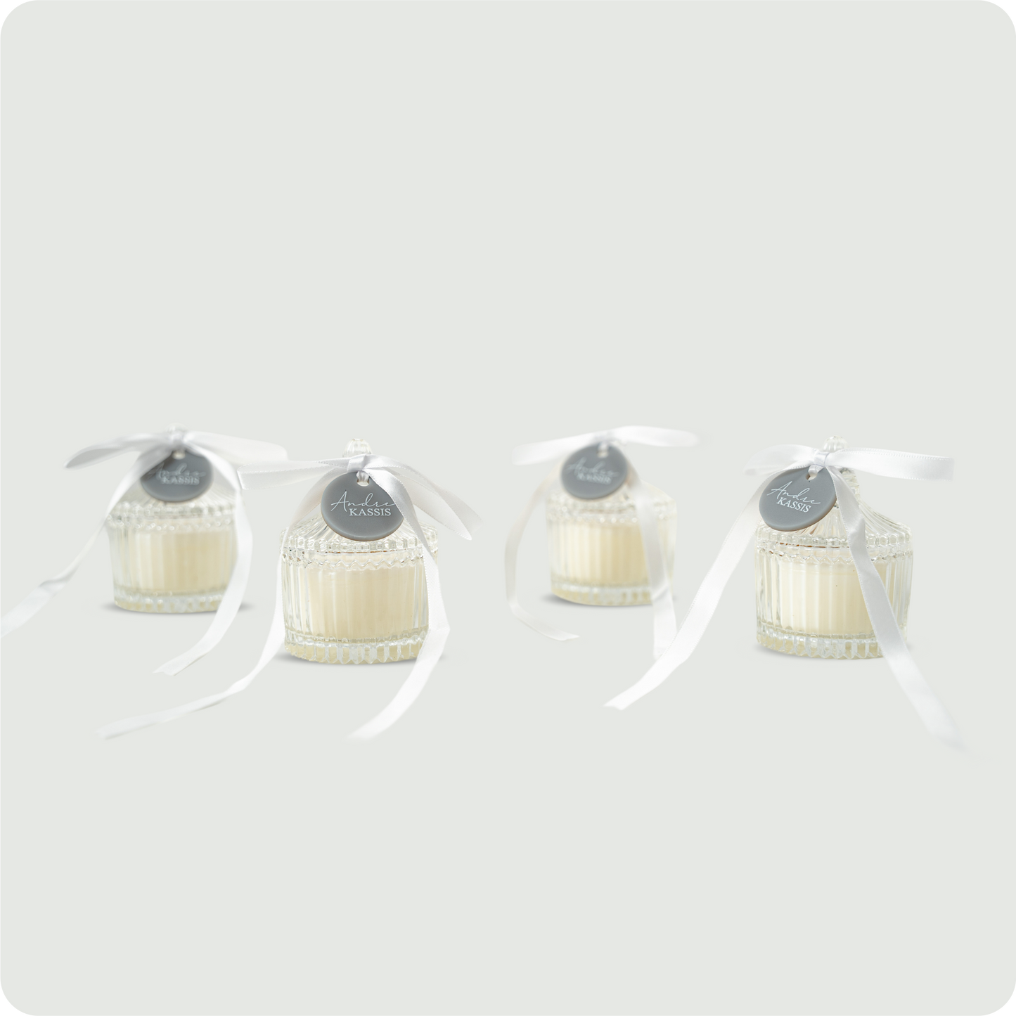 Carousel candle jars with ribbon and tag