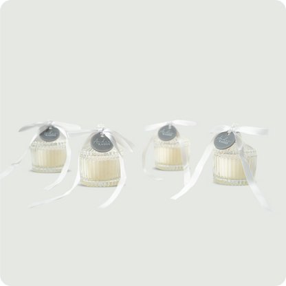 Carousel candle jars with ribbon and tag