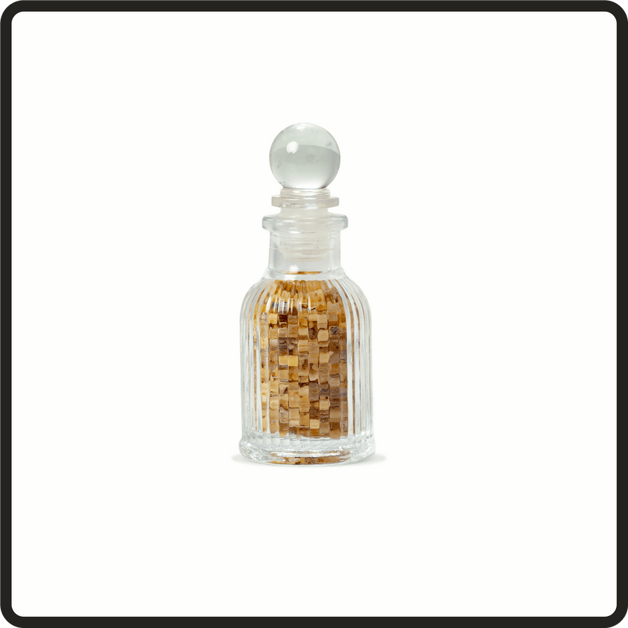 Ribbed bakhour incense bottle.
