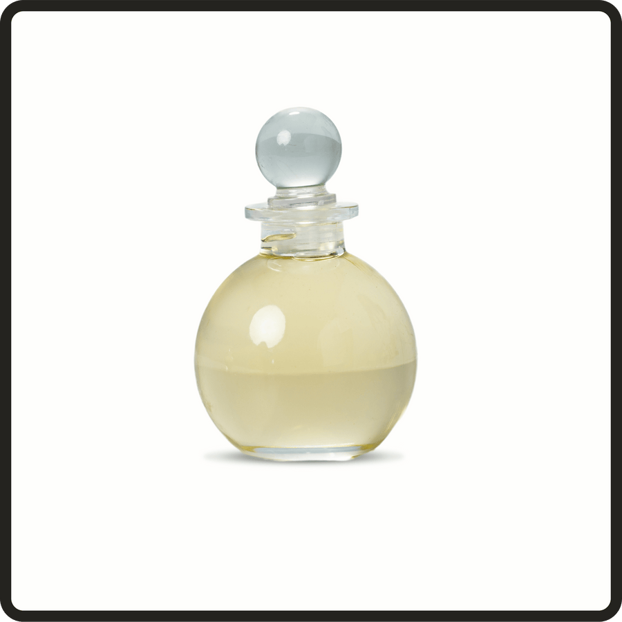 Round holy oil bottle filled with oil.